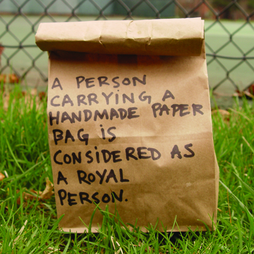 A Person Carrying a Handmade Paper Bag...